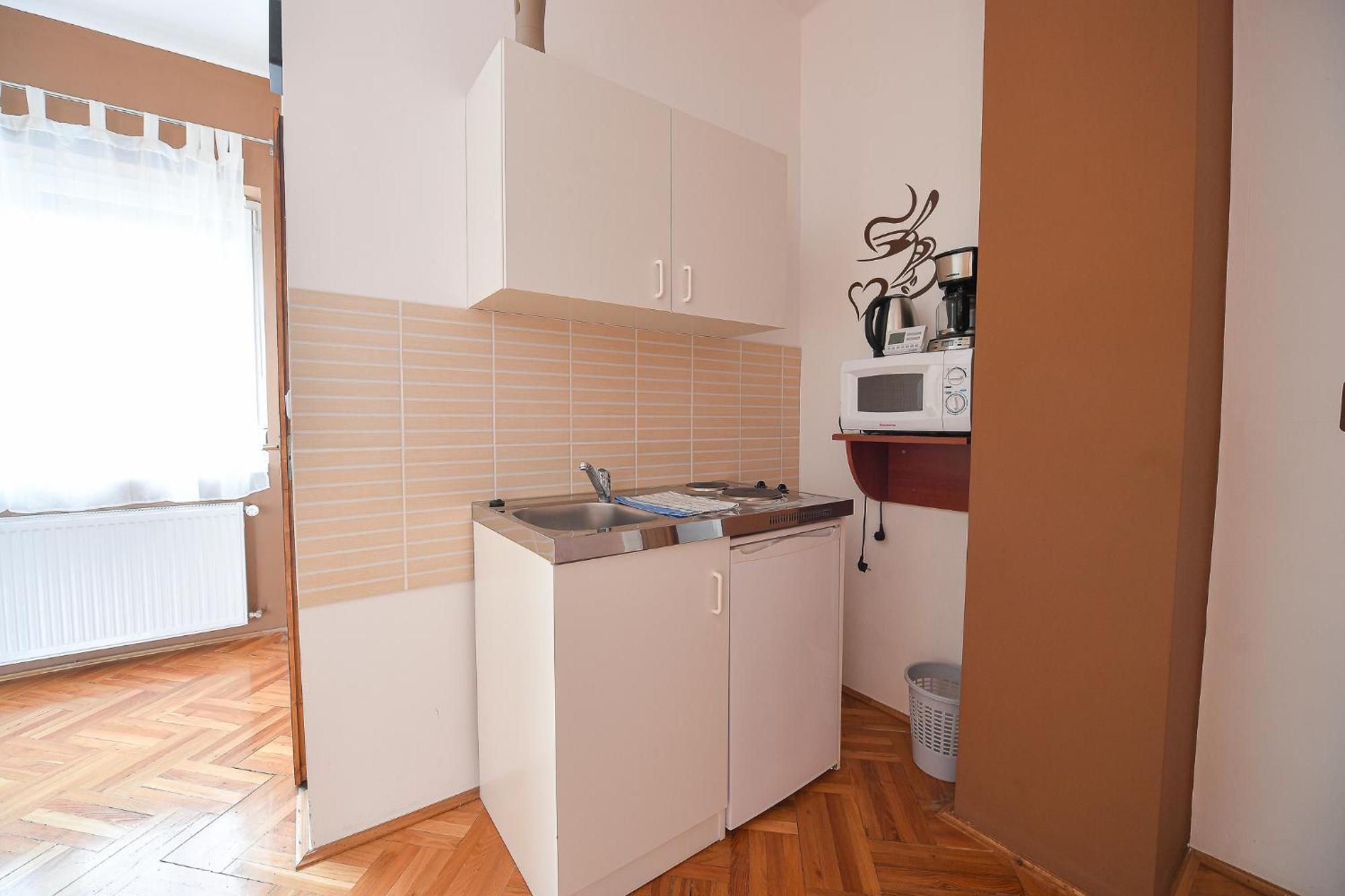 Kokusz Apartmanok Έγκερ Δωμάτιο φωτογραφία